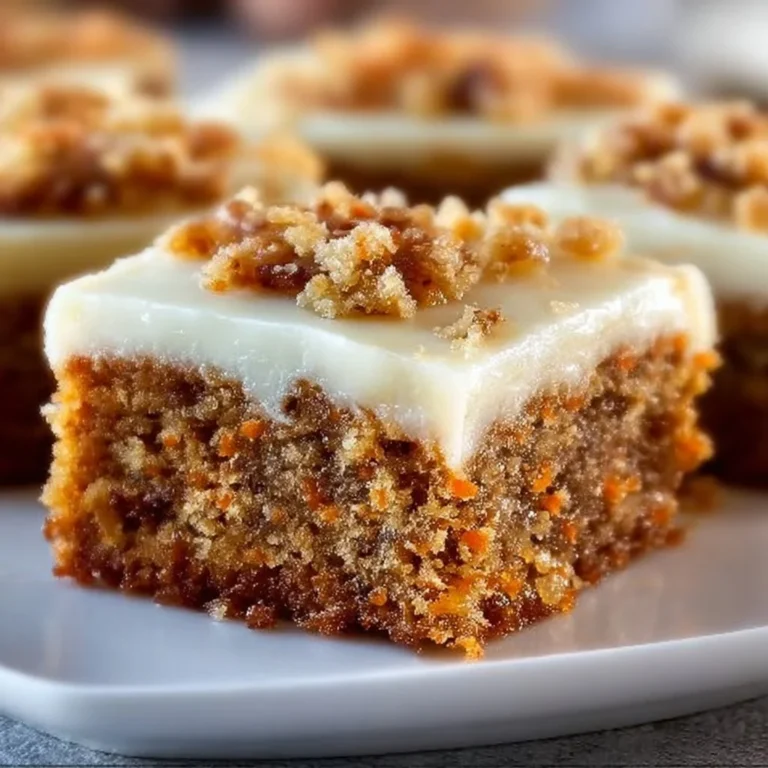 Delicious carrot cake bars with cream cheese frosting and nuts